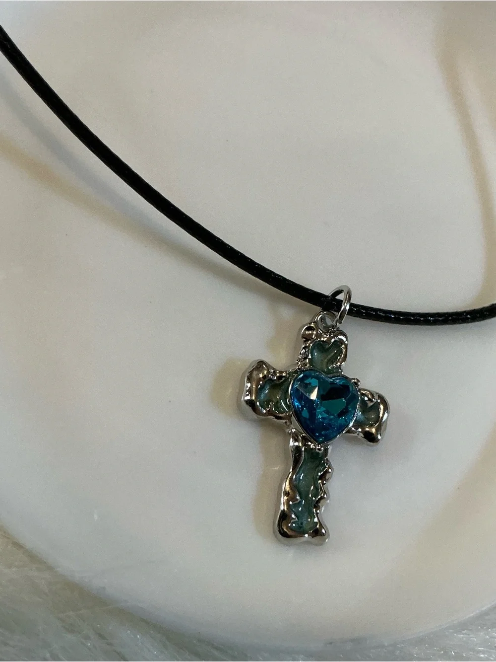 Pretty blue/silver-tone cross/religious pendant black string necklace
